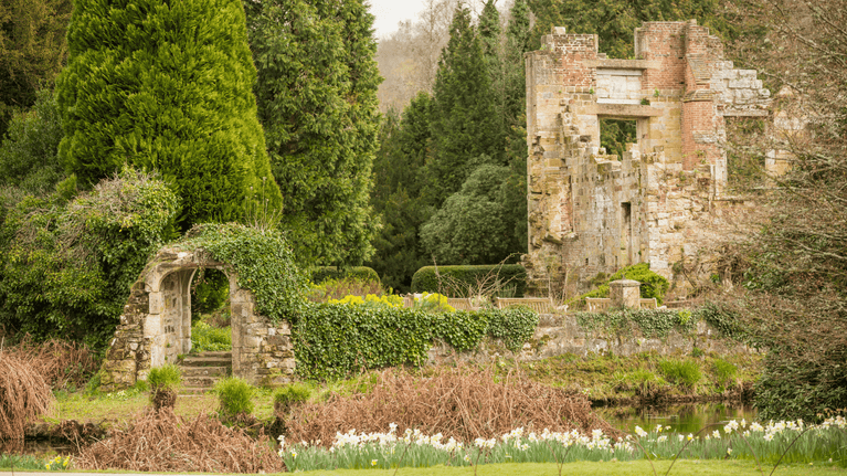 View of the Old Castle and moat in spring at Scotney Castle, Kent